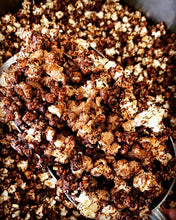 Load image into Gallery viewer, Kettle Korn Christchurch Cinnamon Bomb popcorn kettle corn sprinkled with cinnamon and sugar in a large scoop. 

